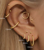 Twist Hoop Earrings Available in Multiple Sizes – Hannah