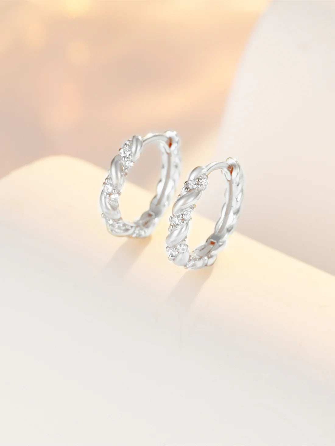 Twist Hoop Earrings with Cubic Zirconia – Bowcer