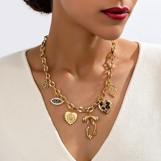 Bowknot Heart Pendant Necklace with Eye and Leaf Design – Lytton