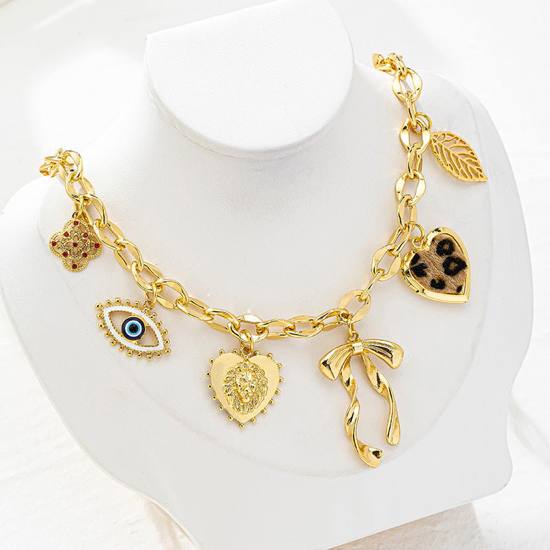 Bowknot Heart Pendant Necklace with Eye and Leaf Design – Lytton